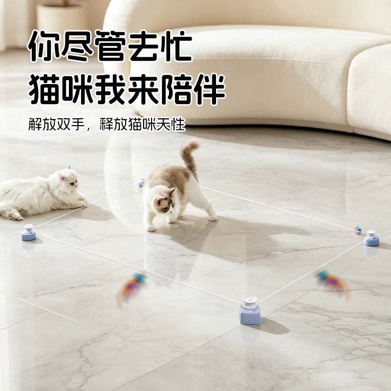Cat running after a feather lure across the floor